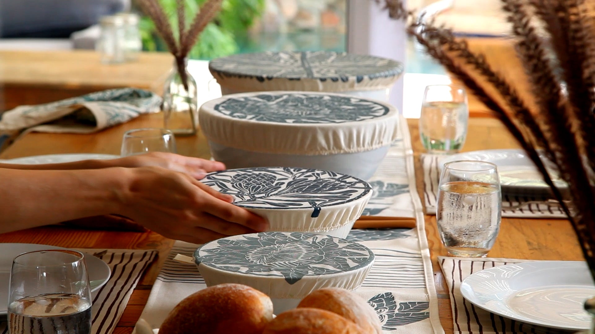 spaza protea set of 4 dish covers and table